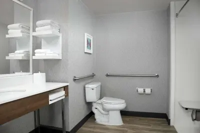 a bathroom with a toilet and a sink at Hampton Inn Easton in Easton