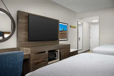 a hotel room with a television and a bed at Hampton Inn Easton in Easton