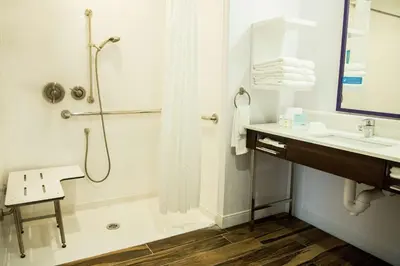 a bathroom with a shower and a sink at Hampton Inn & Suites Warrington Horsham in Warrington