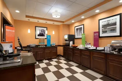 a hotel room with a cash register and a cafeteria at Hampton Inn Lehighton - Jim Thorpe in Lehighton