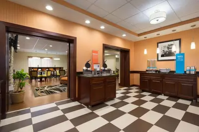 a lobby with a hair salon with a checkered floor at Hampton Inn Lehighton - Jim Thorpe in Lehighton