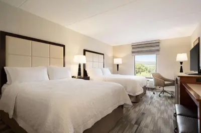 a hotel room with two beds and a window at Hampton Inn Lehighton - Jim Thorpe in Lehighton