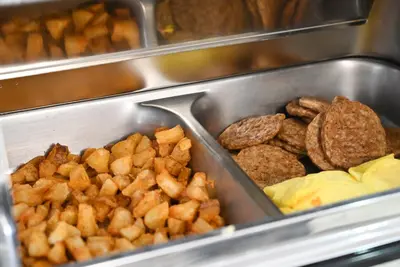 a tray filled with different types of food at Comfort Inn Edgewater on Hudson River in Edgewater