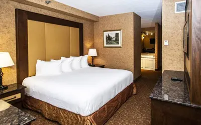 a hotel room with a large bed and a bathroom at Heritage Hills Golf Resort & Conference Center in York