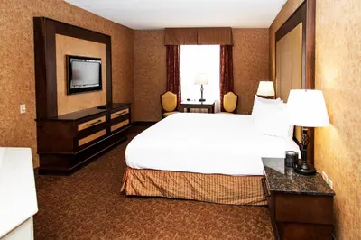 a hotel room with a bed and a television at Heritage Hills Golf Resort & Conference Center in York