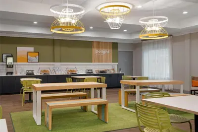 a rendering of a dental office with tables and chairs at Spark by Hilton Rahway in Rahway