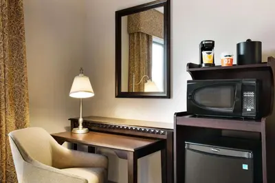 a hotel room with a television and a microwave at Hampton Inn & Suites Mahwah in Mahwah