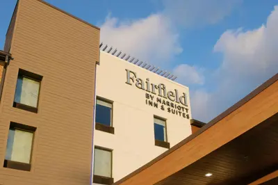 a building with a sign on the side of it at Fairfield Inn & Suites by Marriott Pottstown Limerick in Pottstown