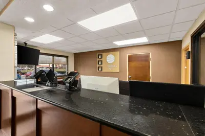 an office cubicle with a black counter top at Comfort Inn Bordentown near NJ Turnpike in Bordentown