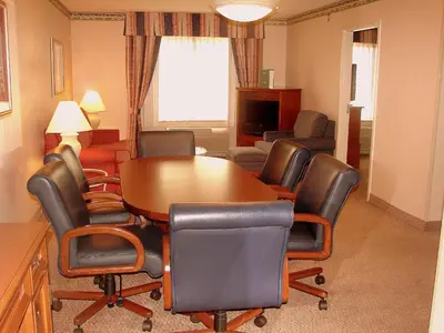 a conference room with a table and chairs at Hilton Garden Inn Nanuet in Nanuet