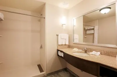 a bathroom with a sink and a mirror at Hilton Garden Inn Nanuet in Nanuet