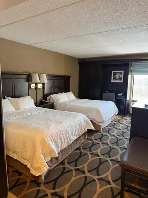a hotel room with two beds and a window at Hampton Inn Harrisburg/Grantville/Hershey in Grantville