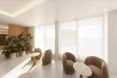 a room with chairs and tables and a large window at DoubleTree by Hilton Wilkes-Barre in Wilkes-Barre