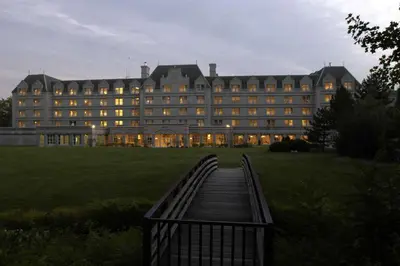 a large building with a walkway in front of it at Hilton Pearl River in Pearl River