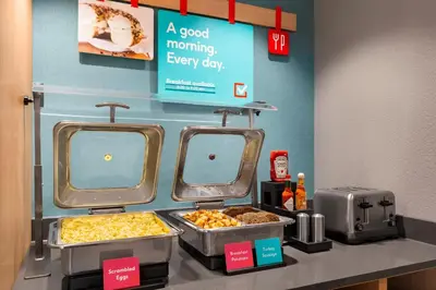 a food counter in a store with some food at avid hotels - Lancaster by IHG in Lancaster
