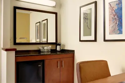 a bathroom with a sink and a mirror at Hyatt Place Bethlehem-Downtown in Bethlehem