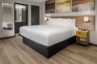 a large bed in a hotel room at Days Inn by Wyndham Wurtsboro in Wurtsboro