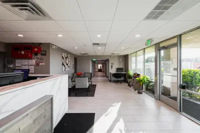an empty lobby of a hospital with a waiting room at Garden Executive Hotel in South Plainfield