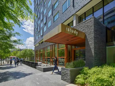 a building with a sign that reads subway at The Study at University City, Study Hotels in Philadelphia
