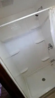 a shower in a bathroom with a white ceiling at Budget Motor Inn- Stony Point in Stony Point