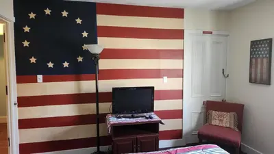 a room with an american flag painted on the wall at Greystone Manor Bed & Breakfast in Bird in Hand