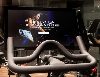 a computer screen on top of a exercise bike at Aliz Hotel Times Square in New York