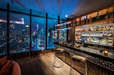 a bar with a view of a city skyline at Aliz Hotel Times Square in New York