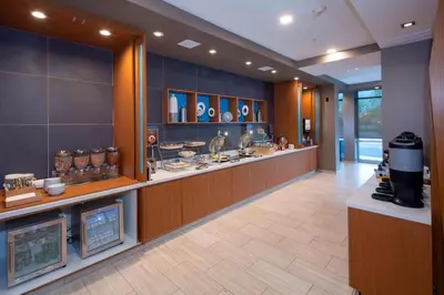 a room with a counter with vases on display at Springhill Suites By Marriott Newark Downtown in Newark