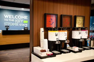 a store display with a bunch of bottles of wine at Hampton Inn Lebanon in Lebanon