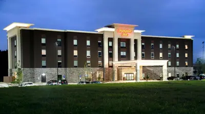 a office building with a sign on the front of it at Hampton Inn Lebanon in Lebanon