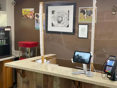 a counter with a computer on top of it at White Rose Motel - Hershey in Hershey