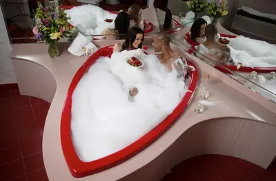 a group of people in a bath tub in a bathroom at Cove Haven Resort in Lakeville