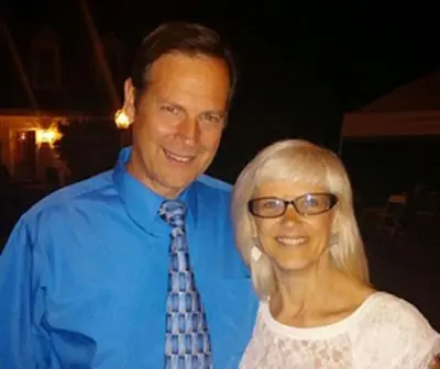 a man standing next to a woman in a tie at Brownstone Colonial Inn in Reinholds