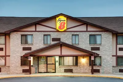a hotel with a sign on the front of it at Super 8 by Wyndham Allentown Kutztown Area in Kutztown