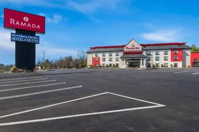 an empty parking lot in front of a mall at Ramada by Wyndham Harrisburg/Hershey Area in Harrisburg