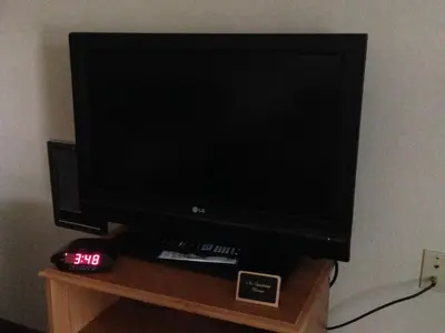 a flat screen tv sitting on top of a table at FairBridge Inn Express Milford in Milford