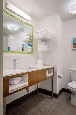a bathroom with a sink and a toilet at Hampton Inn By Hilton Paramus in Paramus