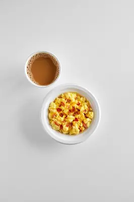 a bowl of cereal and a cup of coffee at Garner Hotel Mahwah by IHG in Mahwah