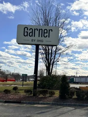 a sign for a garden by hike on a street at Garner Hotel Mahwah by IHG in Mahwah