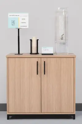 a wooden cabinet with a blender on top of it at Garner Hotel Mahwah by IHG in Mahwah