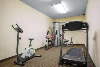 a gym with cardio equipment in a room at Econo Lodge Harrisburg - Hershey in Harrisburg