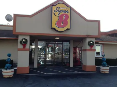 a store front with a super eight sign on it at Super 8 by Wyndham Carlisle North in Carlisle