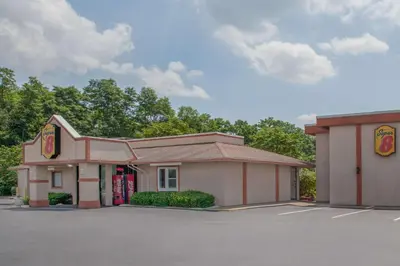 a fast food restaurant in a parking lot at Super 8 by Wyndham Carlisle North in Carlisle