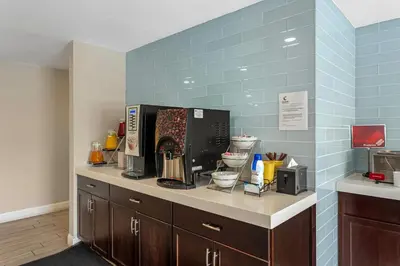 a kitchen with a counter top with a microwave at Comfort Inn & Suites Pottstown Eastern Gateway in Pottstown
