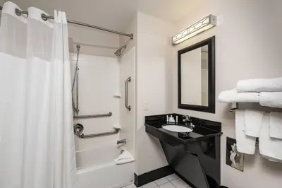 a bathroom with a sink and a shower at Fairfield Inn & Suites by Marriott Philadelphia Valley Forge/Great Valley in Berwyn