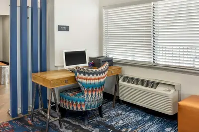 an office with a desk with a computer and a chair at Best Western Westgate Inn in York