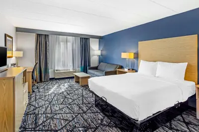 a hotel room with a bed and a television at Best Western Westgate Inn in York