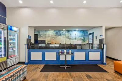 a waiting room with a table and a map on the wall at Best Western Westgate Inn in York
