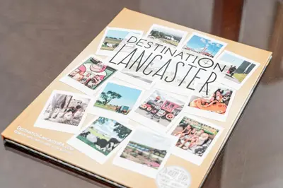 a book about destination rancher sitting on a table at Fulton Steamboat Inn in Lancaster