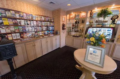 a shop with a table in the middle of a room at Fulton Steamboat Inn in Lancaster